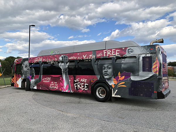 Bus wrap showing community program