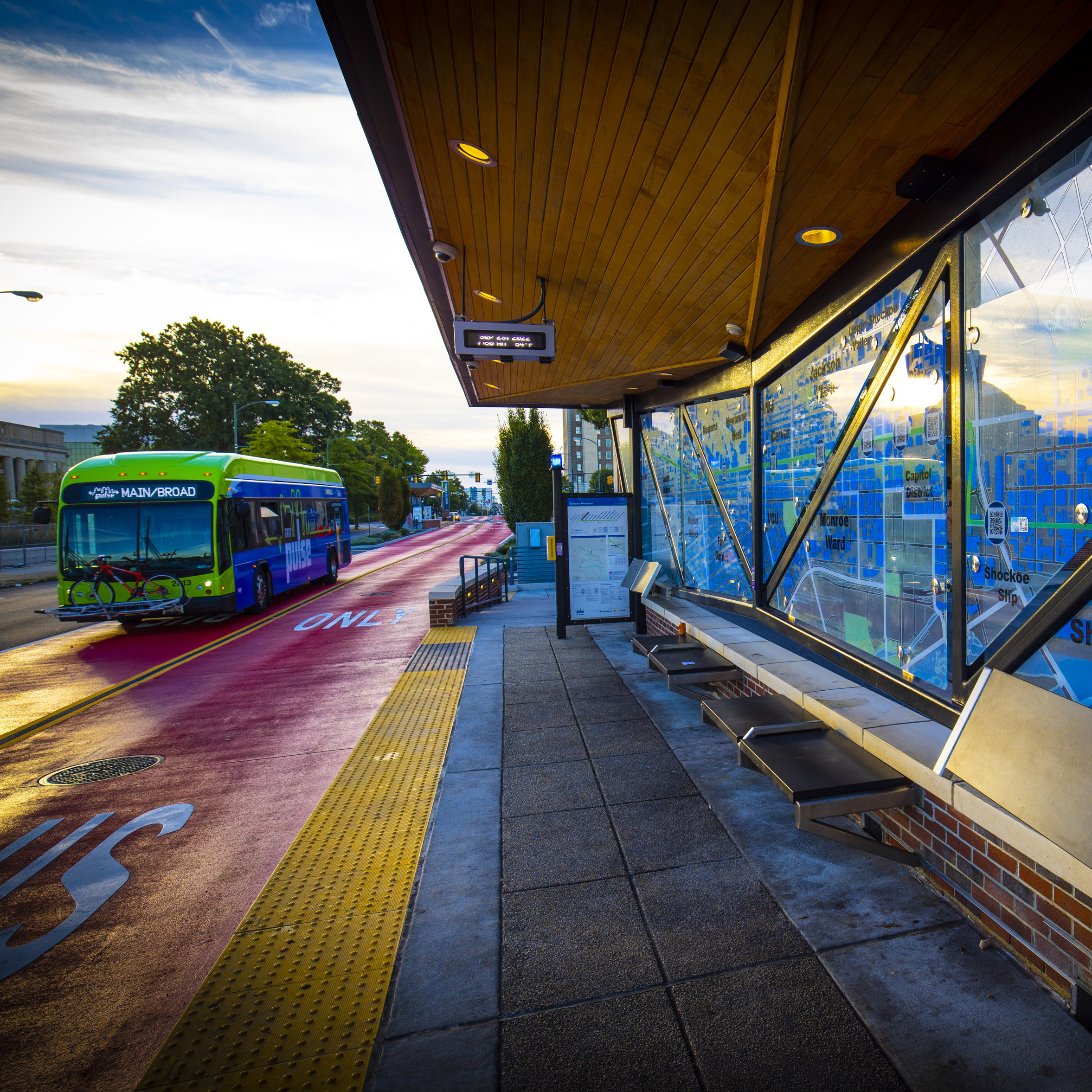 Pulse station project Covered bus stop with large map