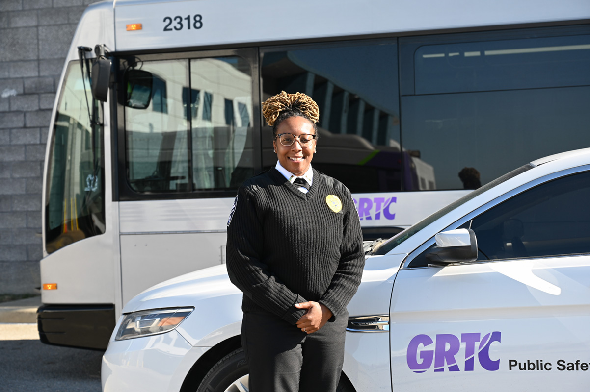 Safety Officer standing with Safety vehicle