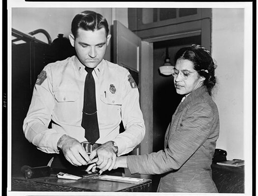 GRTC honors Rosa Parks with picture of Rosa Parks being fingerprinted by police